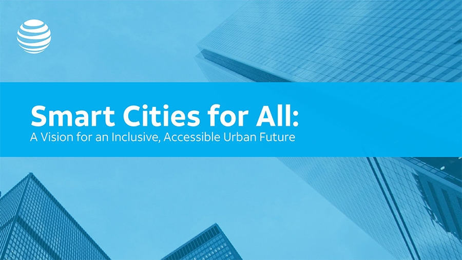 'Smart Cities for All' 이니셔티브의 공식 배너. AT&T 로고와 함께 'Smart Cities for All: A Vision for an Inclusive, Accessible Urban Future'라는 제목이 현대적인 고층 빌딩 이미지를 배경으로 쓰여 있습니다.