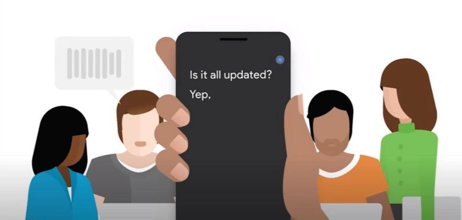 구글 'Live Transcribe'(실시간 자막) 기능의 시연 일러스트. 한 손에 들린 스마트폰이 주변의 대화('Is it all updated?', 'Yep,')를 실시간으로 텍스트 변환하여 화면에 보여주고 있습니다.